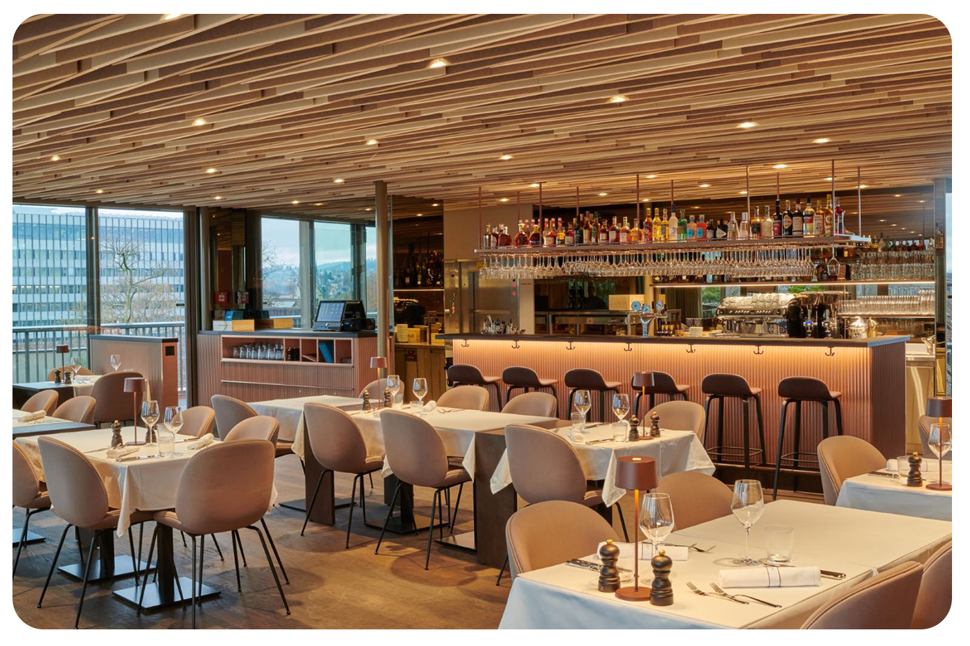 restaurant and bar area with acoustic solution on the ceiling