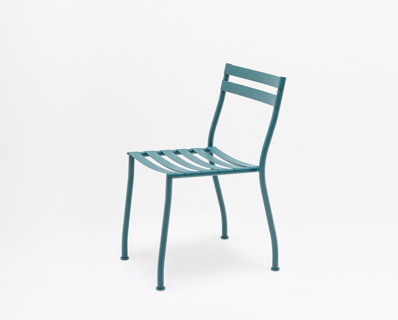 turquoise flaner outdoor chair in a light grey background