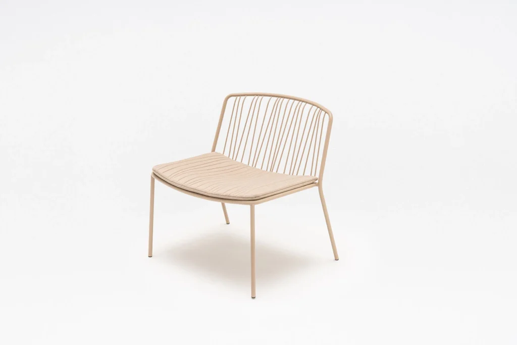 bris outdoor lounge chair in beige with a beige cushion
